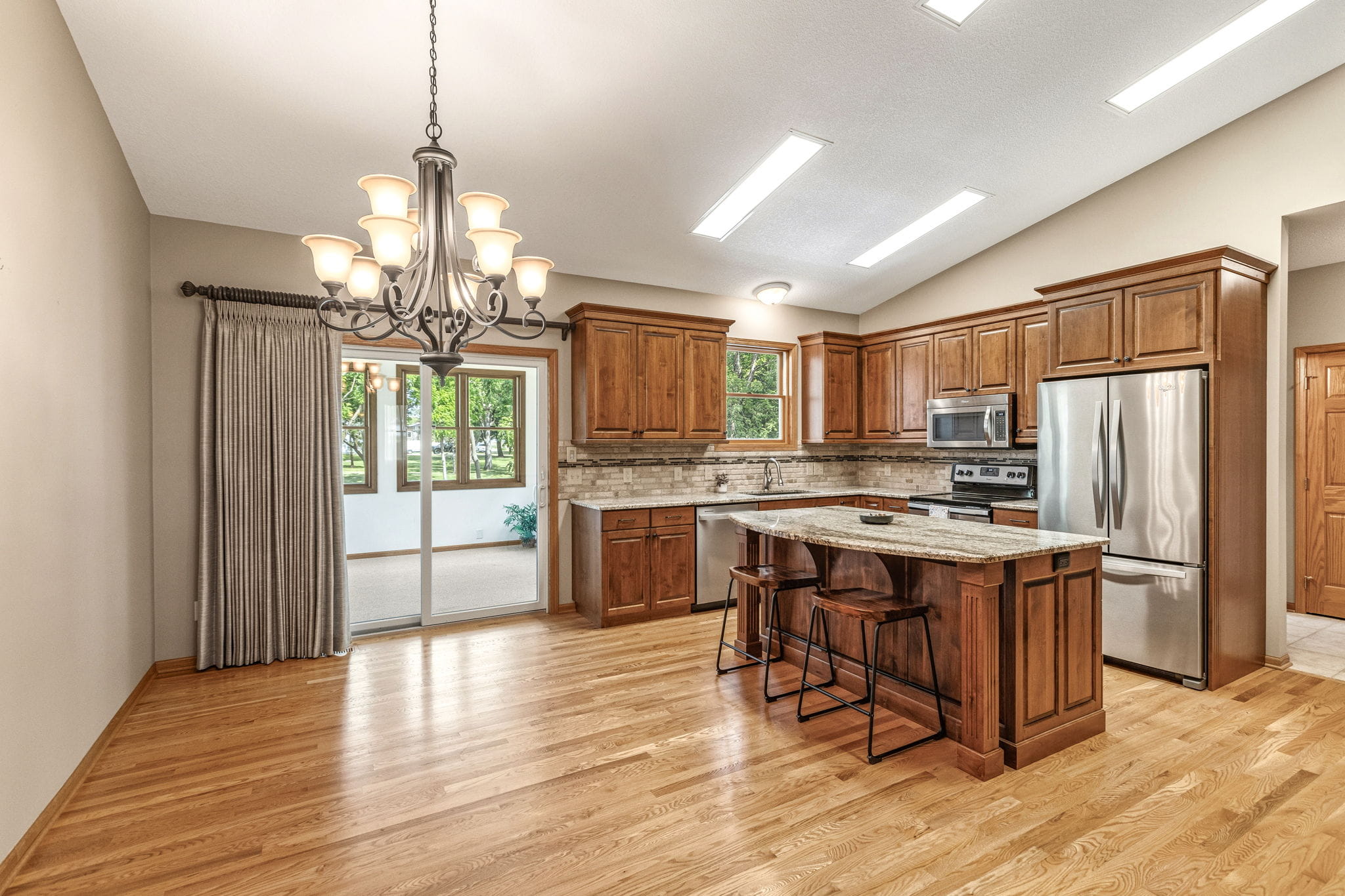 Kitchen with dining area and porch access